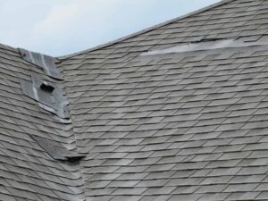 damaged residential roof
