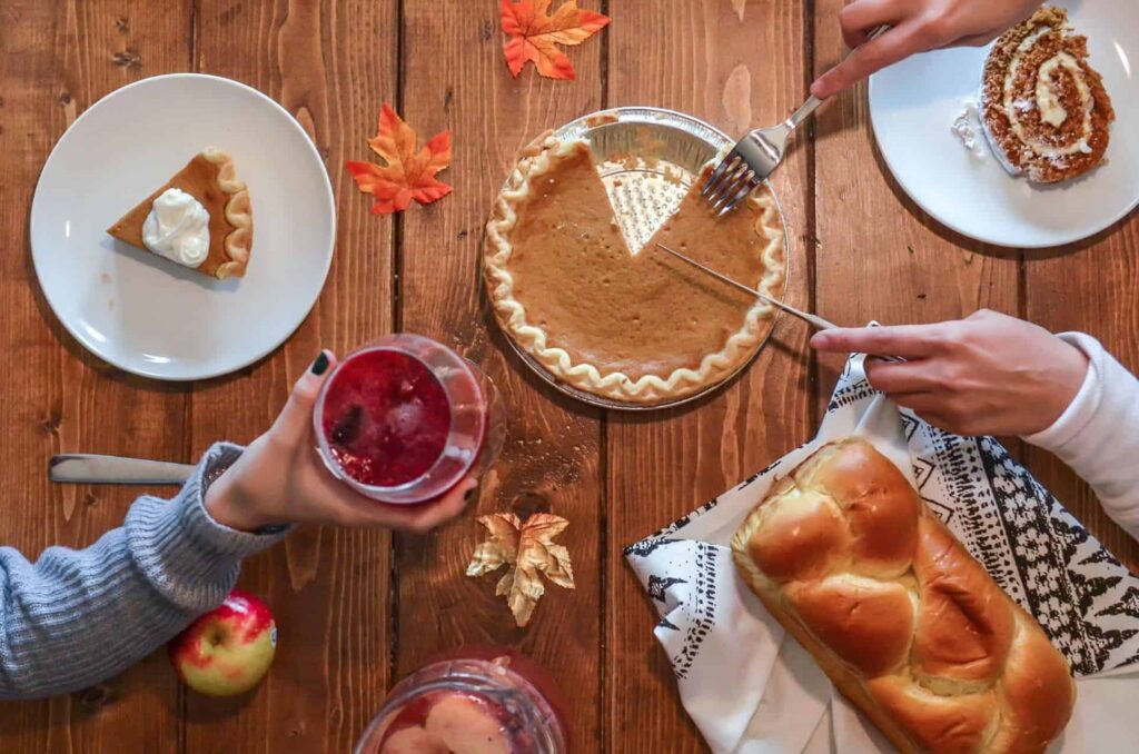 Pumpkin pie on wooden table