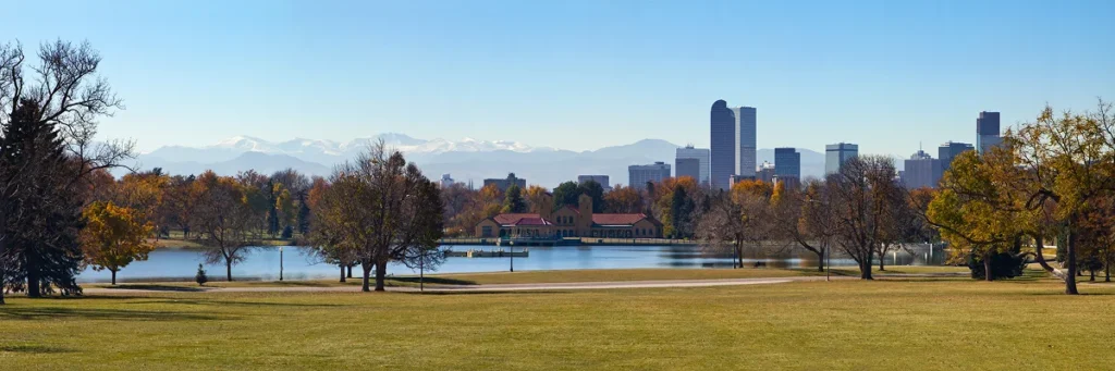 Scenic Denver skyline and city park representing the service area of Elite Roofing & Solar, denver roofing contractor