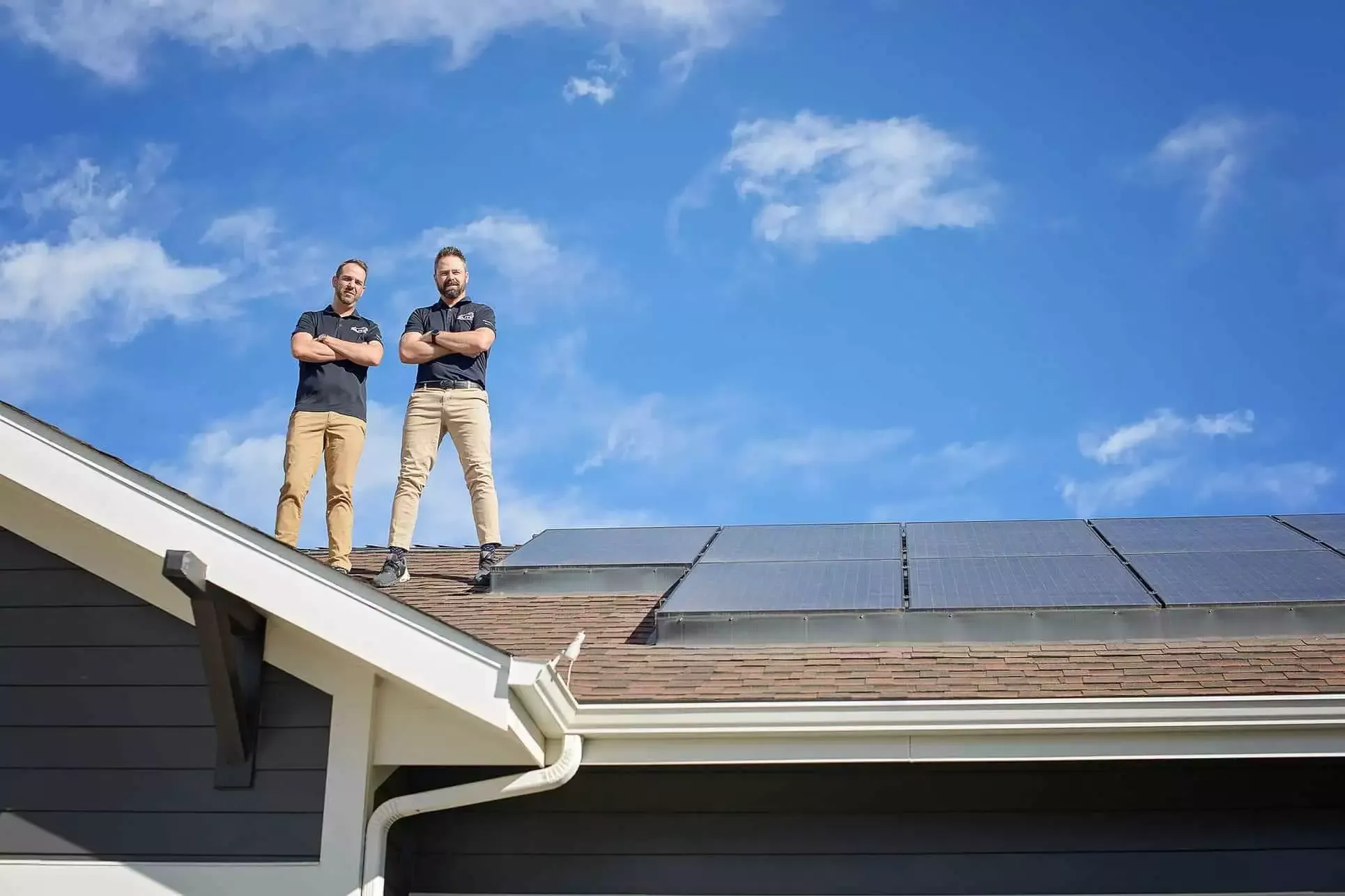 cody hayes and randy brothers on top of a residential roof with Elite Roofing & Solar in Denver, CO
