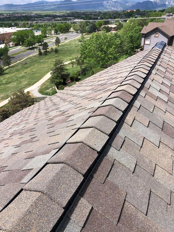 Elite Roofing & Solar new roof replacement showing ridge cap