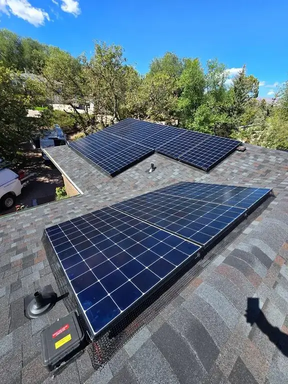 Roof replacement Rooftop solar panels installed by Elite Solar showcasing expert roofing and solar in Colorado Springs in Michigan