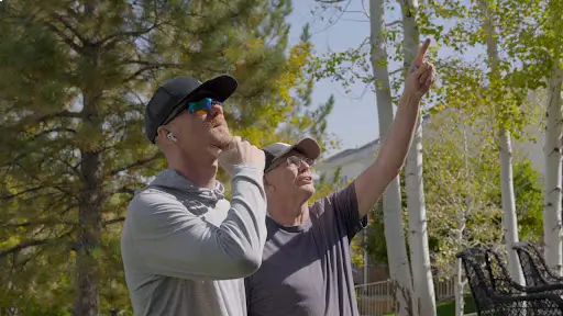 Two Roofing and solar Roofing and solar in Johnstown experts from Elite Solar inspecting a home roof , Michigan