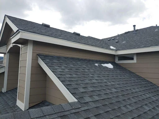 Scenic view of Arvada, CO neighborhoods and mountain range backdrop by Elite Roofing and Solar