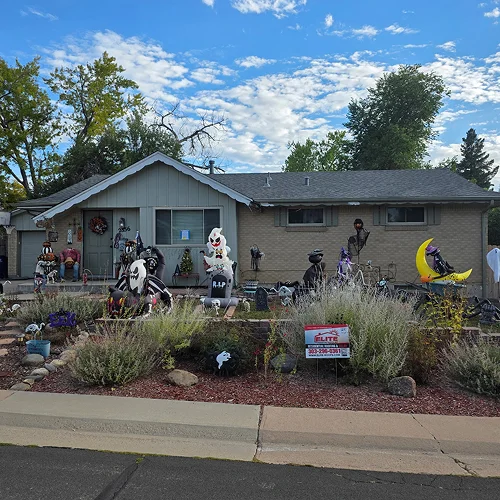 Finished roof and decorated Denver home from community roofing project Denver by Elite Roofing & Solar in Denver