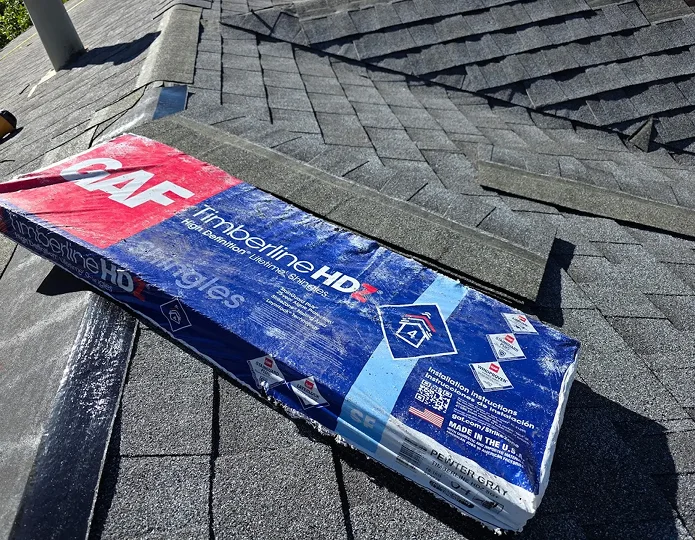 GAF Timberline HDZ roof shingles being installed by Elite Roofing and Solar in Brighton, CO