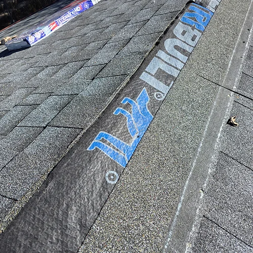 Roof underlayment installation during community roofing project Denver by Elite Roofing & Solar in Denver