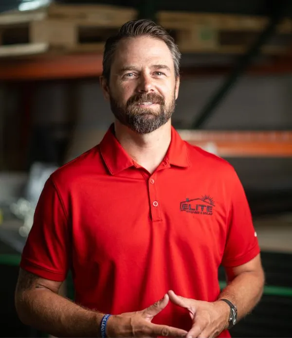 Randy Brothers, President and Founder of Elite Roofing & Solar, standing confidently representing roofing and solar services in Colorado