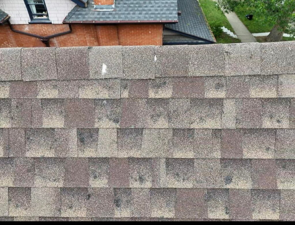 arial view of hail damage on a roof in Denver from the recent storm
