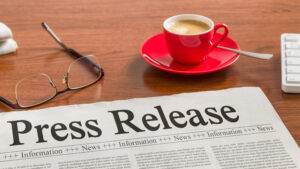 press release newspaper with red coffee cup Elite Roofing & Solar in Denver, CO