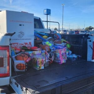 A truck full of toys for the 10th Annual Toys for Tots by Elite Roofing & Solar in Denver